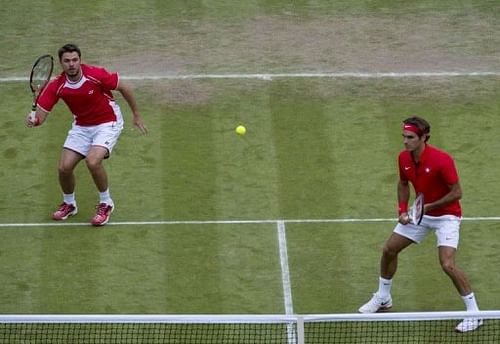 Switzerland's Roger Federer (R) and Stanislas Wawrinka, pictured on July 30.