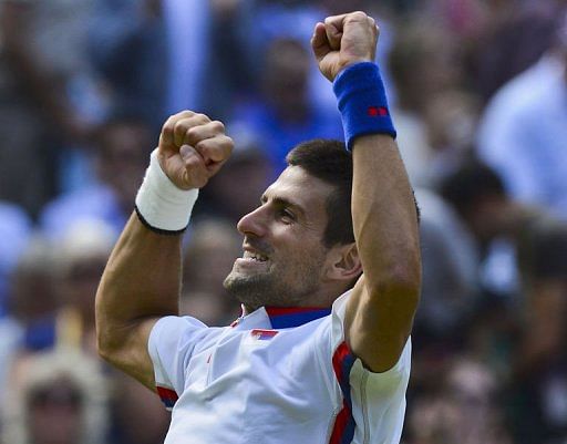 Serbia&#039;s Novak Djokovic celebrates his victory over France&#039;s Jo-Wilfred Tsonga