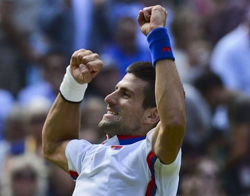 Serbia's Novak Djokovic celebrates his victory over France's Jo-Wilfred Tsonga