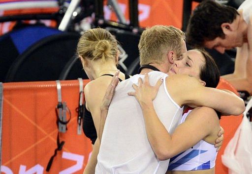 Great Britain&#039;s Victoria Pendleton is comforted by a member of her team
