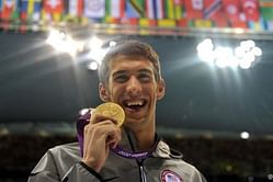 Bolt, Blake take to track as Phelps leaves pool