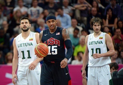 US forward Carmelo Anthony (C) Lithuanian forward Simas Jasaitis (R) and forward Linas Kleiza