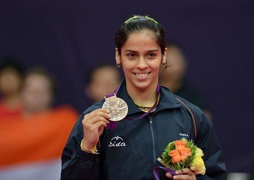 India&#039;s Saina Nehwal poses with her bronze medal