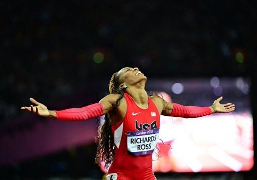 USA&#039;s Sanya Richards-Ross celebrates after winning  the women&#039;s 400m final