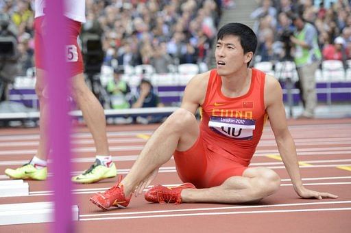 Liu Xiang ploughed into the first hurdle with his left leading leg and crashed heavily to the floor