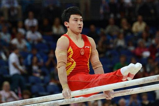 China's Feng crowned parallel bars champion