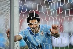 Suarez agrees new Liverpool deal