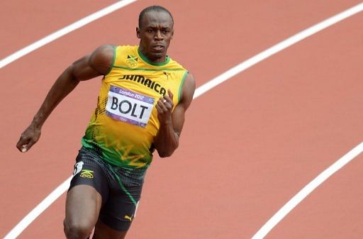 Usain Bolt coasted through to the next round in 20.39sec despite virtually jogging across the line on Tuesday