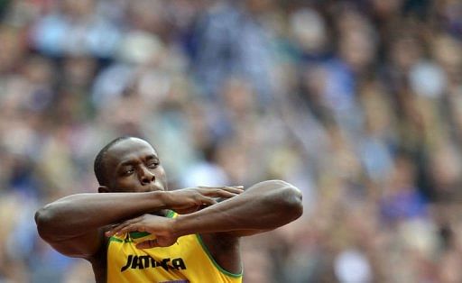 Jamaica&#039;s Usain Bolt gestures before the men&#039;s 200m heats