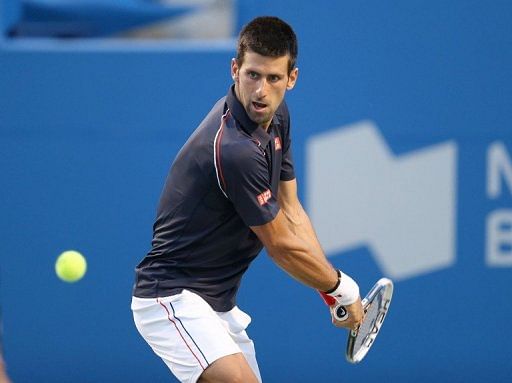 Novak Djokovic (pictured) defeated Bernard Tomic in 71 minutes, 6-2, 6-3