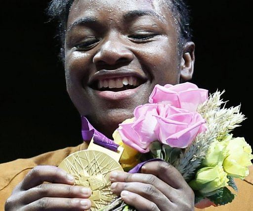 Claressa Shields of the USA holds her gold medal