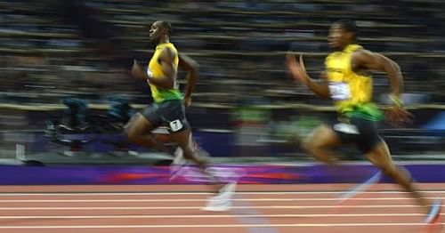 Jamaica's Usain Bolt (L) and Jamaica's Yohan Blake