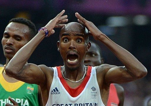 Britain&#039;s Mohamed Farah celebrates after winning the men&#039;s 5000m final