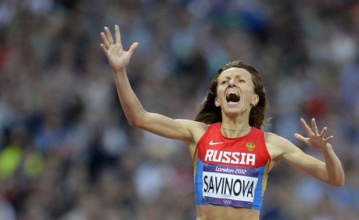 Russia&#039;s Mariya Savinova celebrates after winning the women&#039;s 800m final