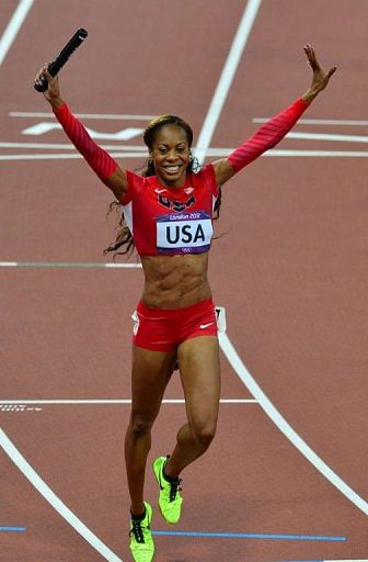 USA's Sanya Richards-Ross celebrates after they won the women's 4X400 relay final