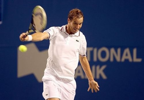 Richard Gasquet of France hits a return during a match