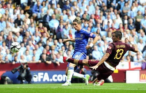 Chelsea striker Fernando Torres scores the opening goal during Community Shield against Manchester City at Villa Park