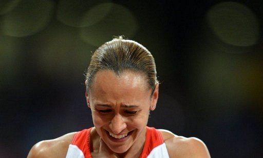 Jessica Ennis appears to half laugh, half cry as she wins the women&#039;s heptathlon