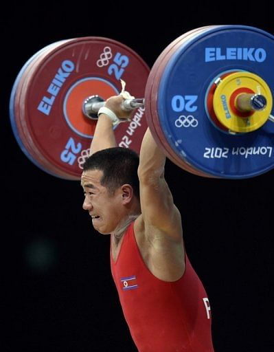 North Korea's Om Yun-Chol lifted three times his bodyweight to win the 56kg category