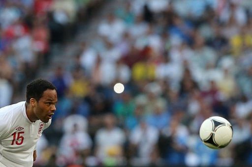 The decision to call up Manchester City defender Lescott had already been taken before Oxlade-Chamberlain pulled out