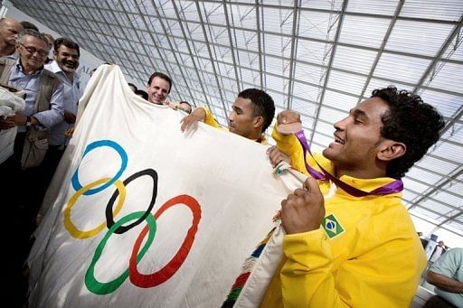 Also on board were Brazilian athletes -- some with medals around their necks -- who competed in the London Games