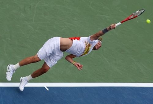 US 10th seed Mardy Fish serves at the Cincinnati Masters