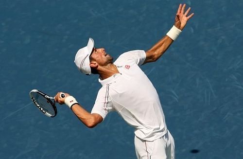 Novak Djokovic of Serbia serves to Andreas Seppi of Italy