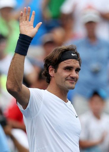 Roger Federer turned in another flawless performance, schooling Australian teenager Bernard Tomic with 27 winners