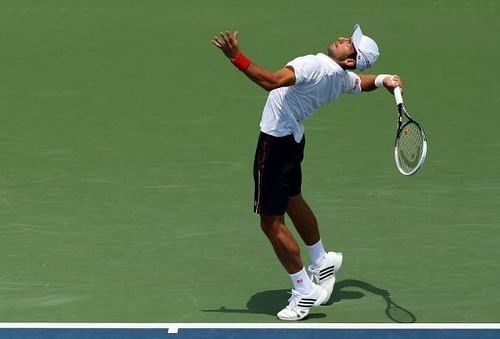 Novak Djokovic of Serbia serves