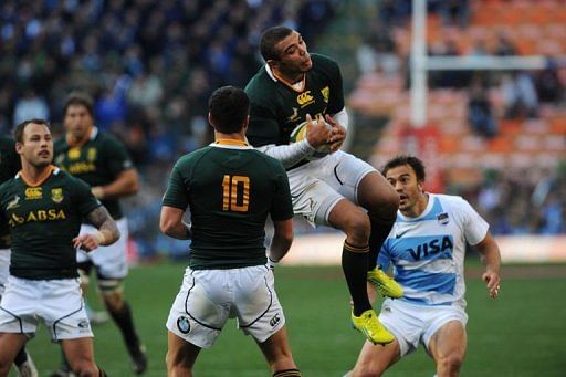 South Africa&#039;s Bryan Habana (C) catches a high ball during match against Argentina
