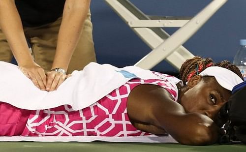 Venus Williams produced two of her eight double-faults on break points to lose games.