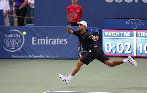 James Blake returns a winner down the line to Andy Roddick