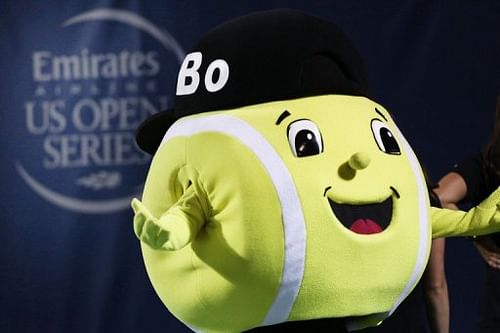 Mascot Bo waves to fans following a match at the Winston-Salem Open