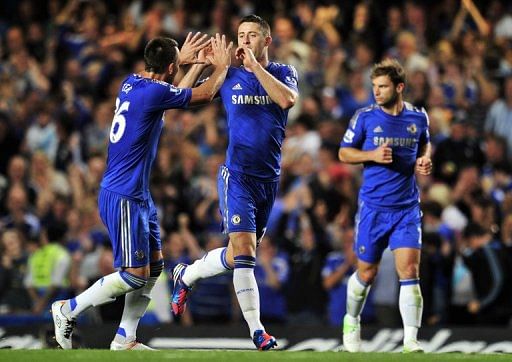 Chelsea&#039;s English defender Gary Cahill (C) celebrates scoring the equalising goal with English defender John Terry (L)