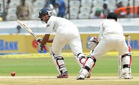 Pujara cracks half-century on comeback