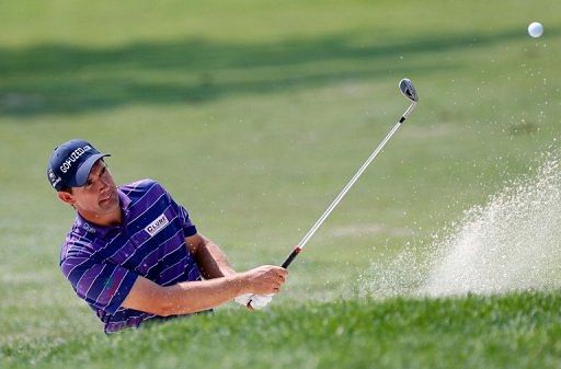 Irishman Padraig Harrington has seized the first-round lead with a seven-under 64 at The Barclays