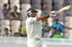 Pujara, Dhoni put India in command over NZealand