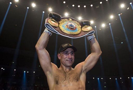 Arthur Abraham is the world champion at the heavier weight after the judges scored the fight 116-112, 116-112, 115-113