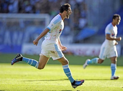 Marseille&#039;s French midfielder Andre Pierre Gignac celebrates after scoring