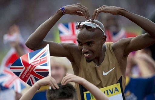 Great Britain&#039;s Mo Farah does the 