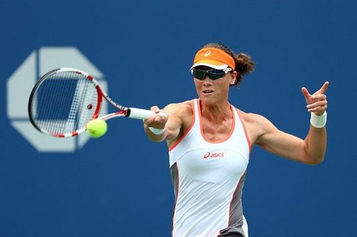 Samantha Stosur of Australia returns a shot