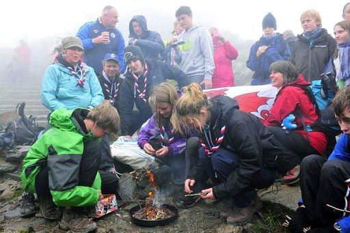 Gwynedd Scouts kindle the Welsh National Flame on top of Mount Snowdon, the highest peak in Wales