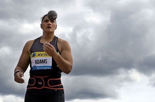 Adams crushes rivals with meet record