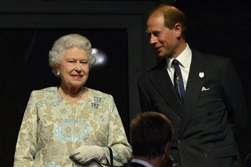 Britain&#039;s Queen Elizabeth II (L) talks with Prince Edward, Earl of Wessex