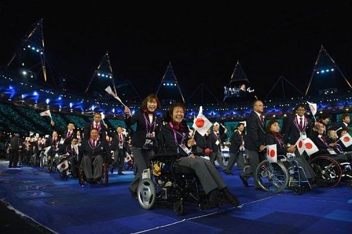 Members of Japan&#039;s delegation parade during the opening ceremony of the London 2012 Paralympic Games