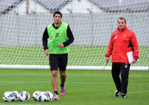 Suarez back at Melwood, Carroll to West Ham Off and Nuri Sahin