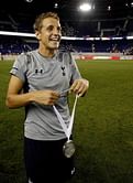 Spurs win huge medals and tiny trophies
