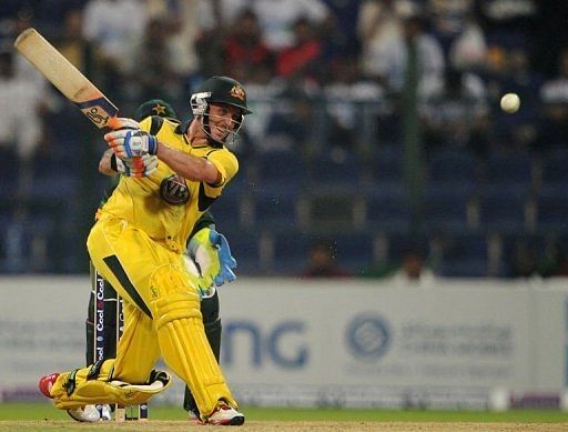 Australian batsman Michael Hussey plays a shot
