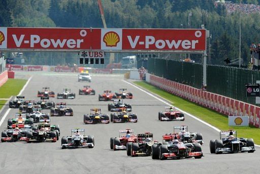 McLaren Mercedes&#039; driver Jenson Button  (2nd right) leads at the start of racing at the Spa-Francorchamps circuit