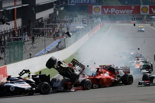 Lotus F1 Team&#039;s Romain Grosjean, Ferrari&#039;s Fernando Alonso and McLaren Mercedes&#039; Lewis Hamilton crash
